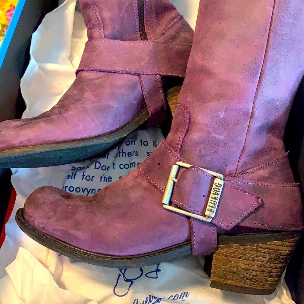John Fluevog’s Luna boot. Size 8 is a warm plum color. Like new!